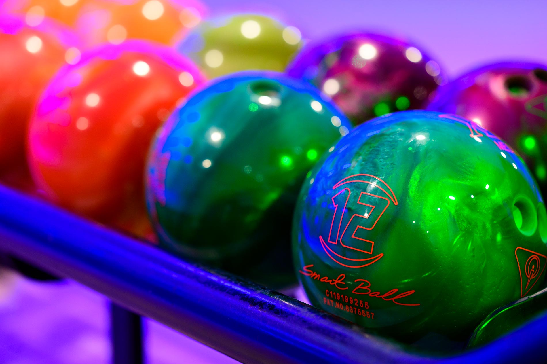 Colourful bowling balls at Tenpin