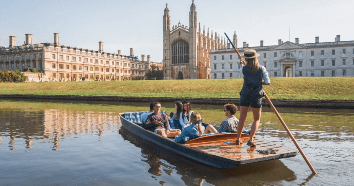 Young People Punting On The River Cam In Cambridge