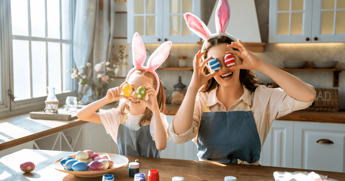 Mother And Daughter Holding Easter Eggs To Eyes (1)