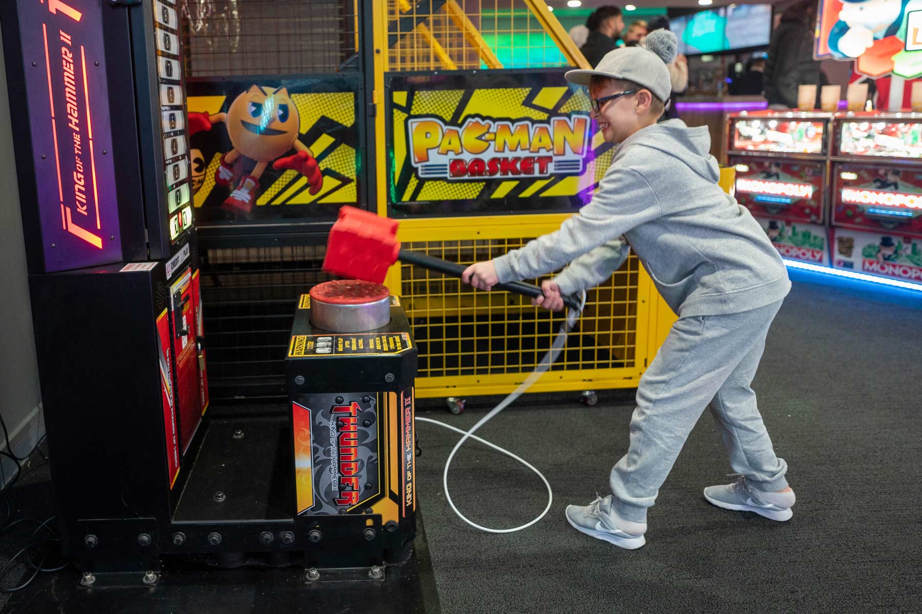 Little Boy Having A Go At The Hammer Game In Tenpin Nottinghams Arcade
