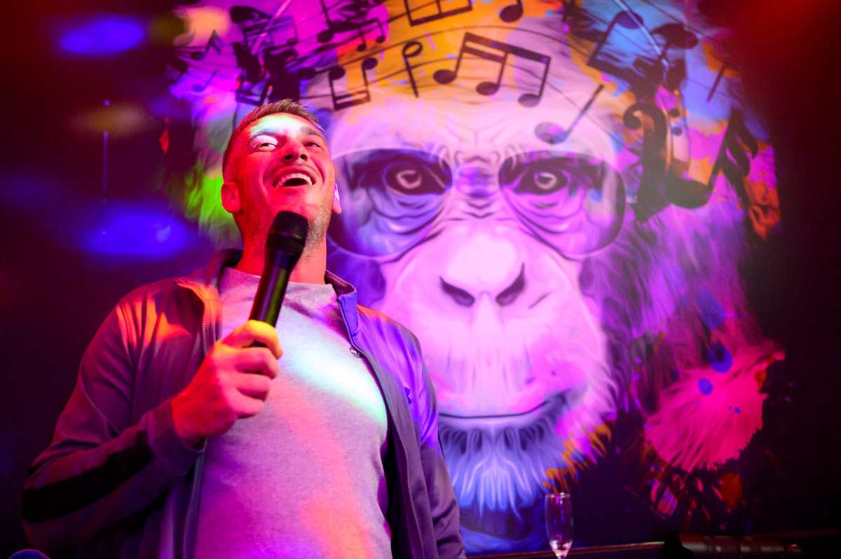 Man singing in karaoke room