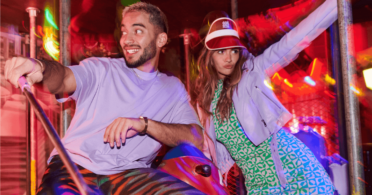 a young couple at junkyard golf in manchester