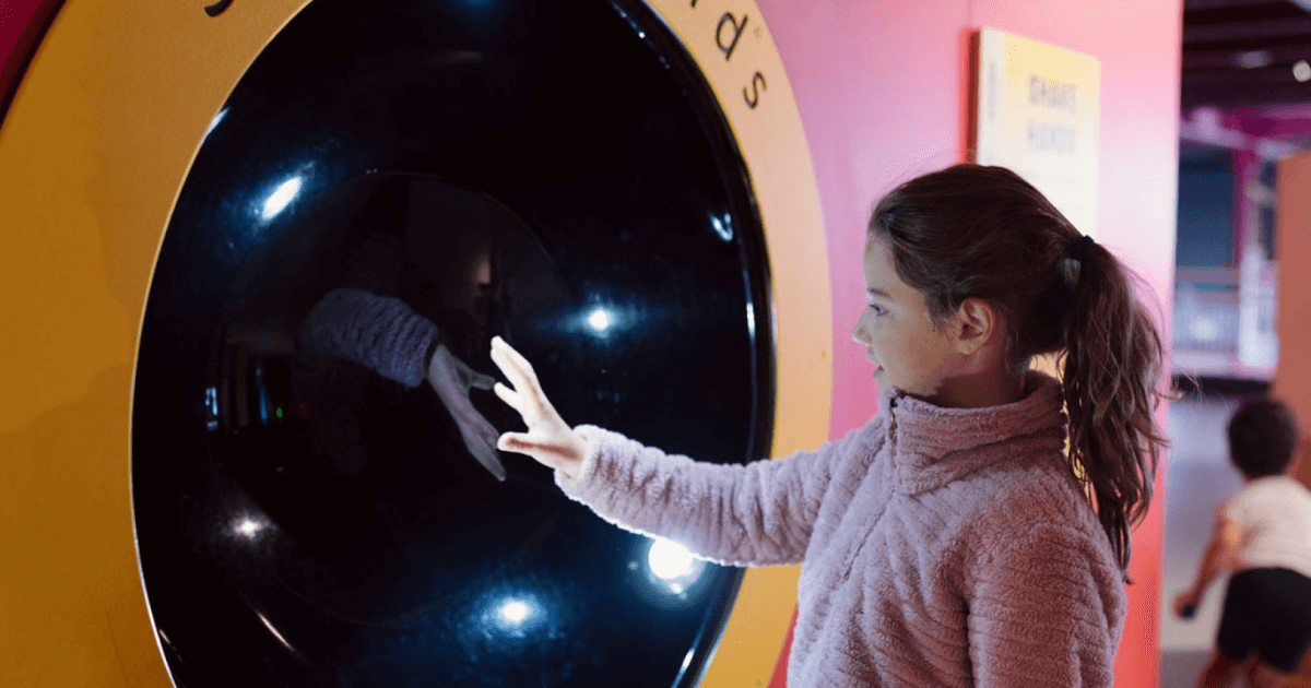 young girl at the science museum