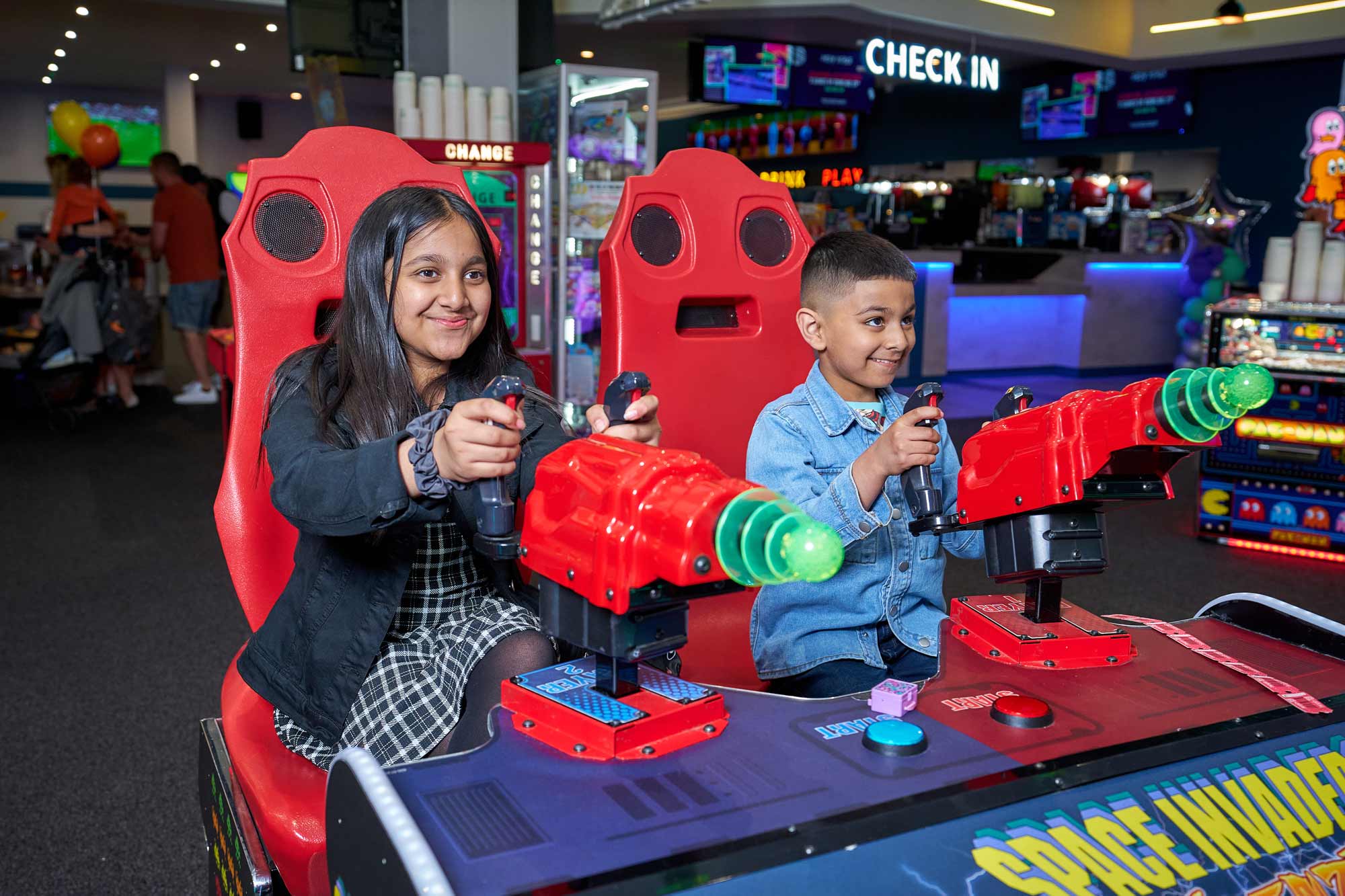 Children Playing In Arcade At Tenpin Stoke