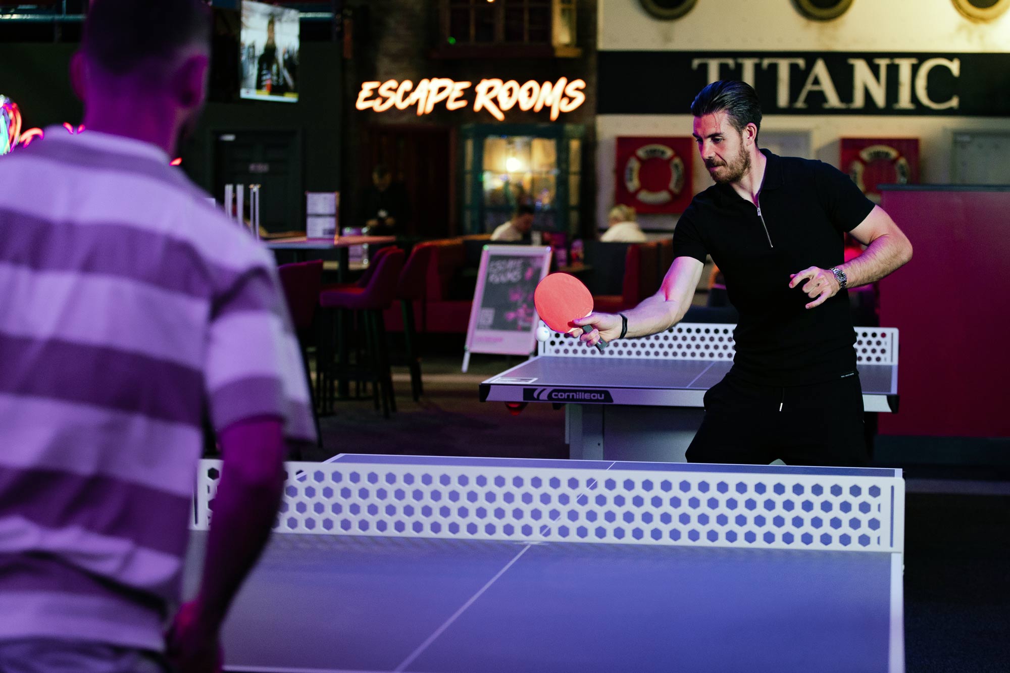 Men Playing Table Tennis