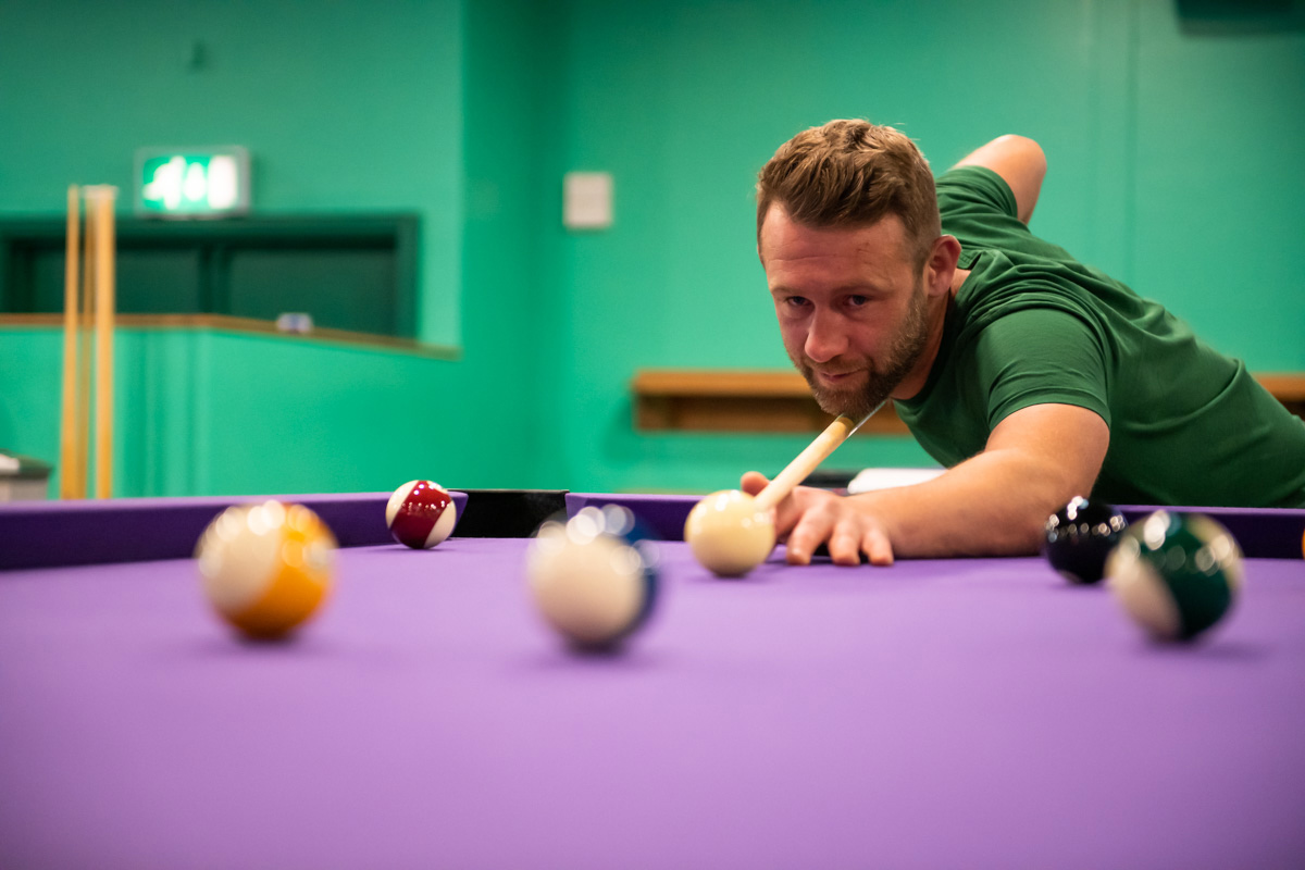 Man Playing Pool At Tenpin