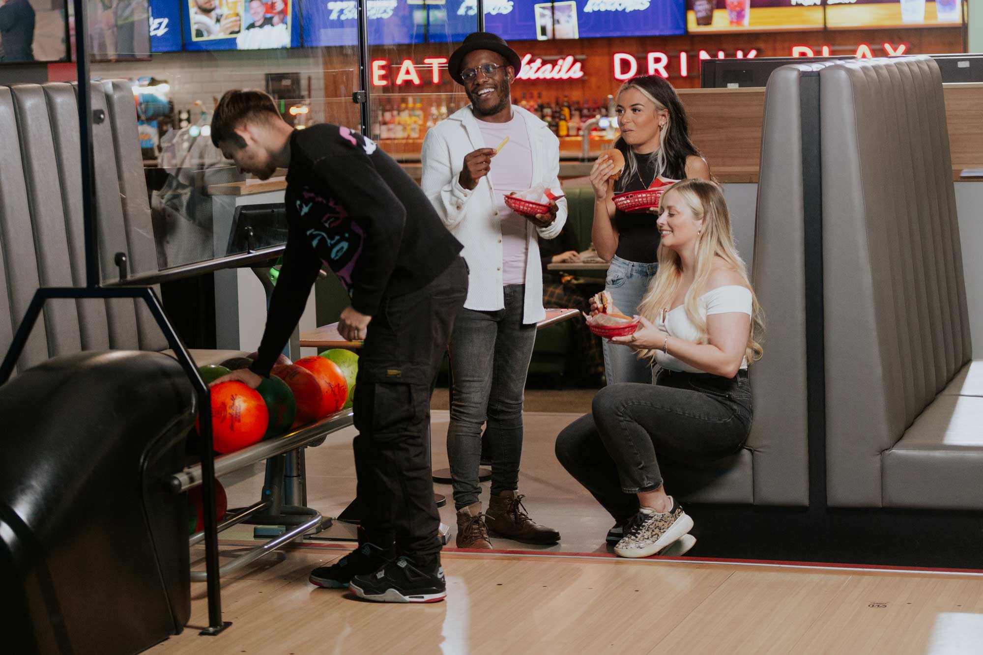 Milton keynes bowling friends enjoying food