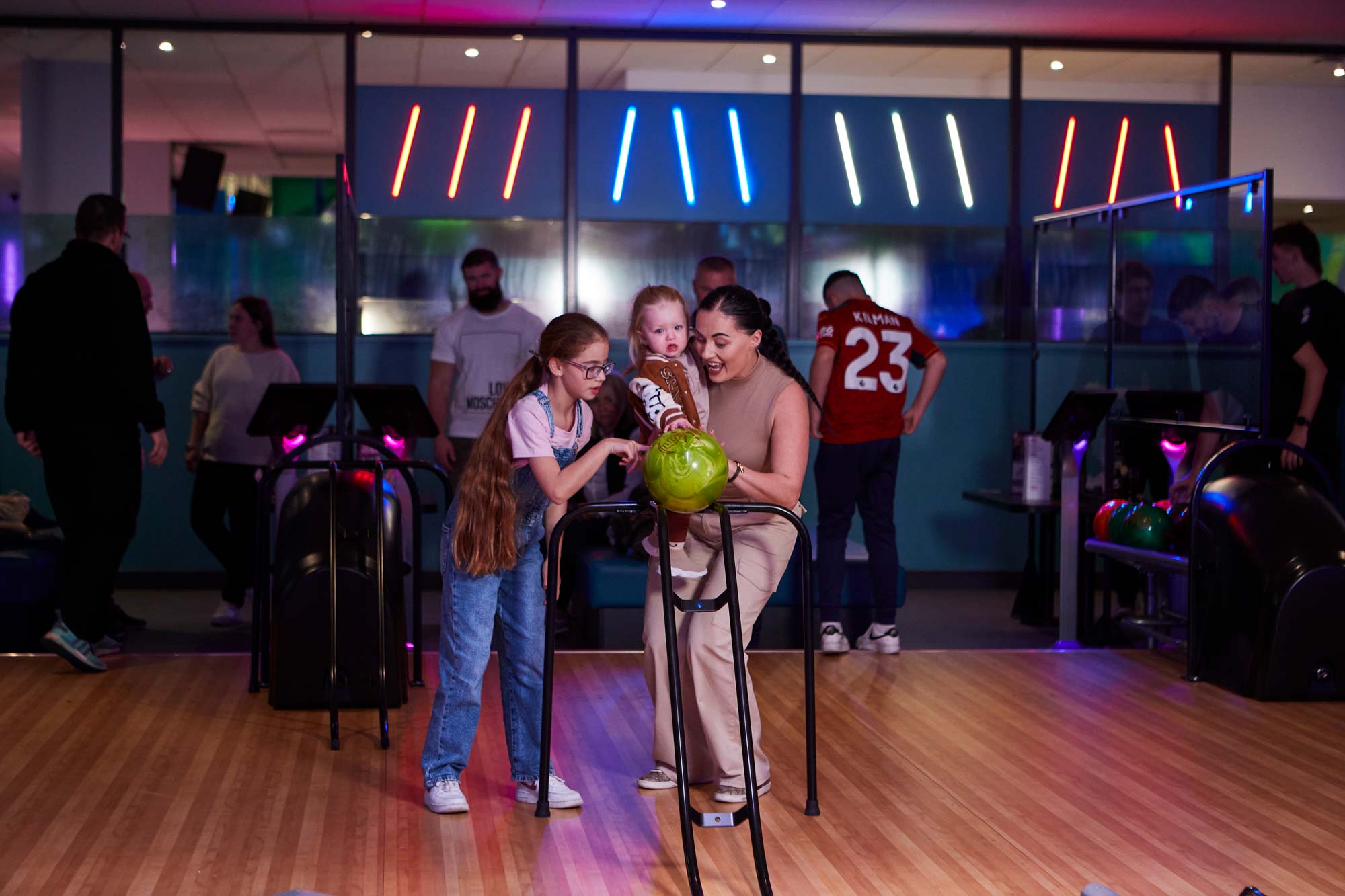 Bowling Stafford Family Using Bowling Ramp