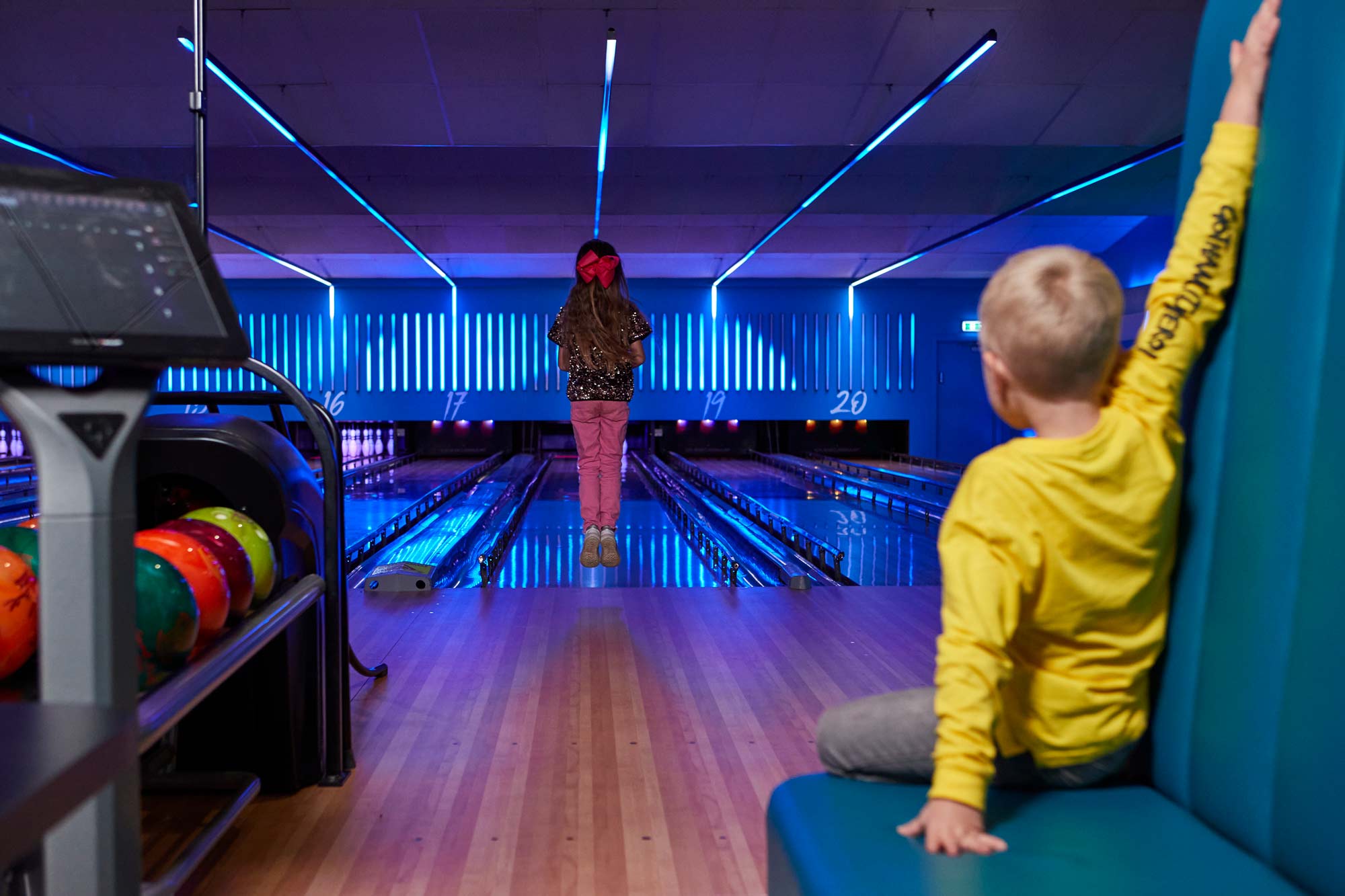 Bowling Stafford Girl Jumping At End of Lane