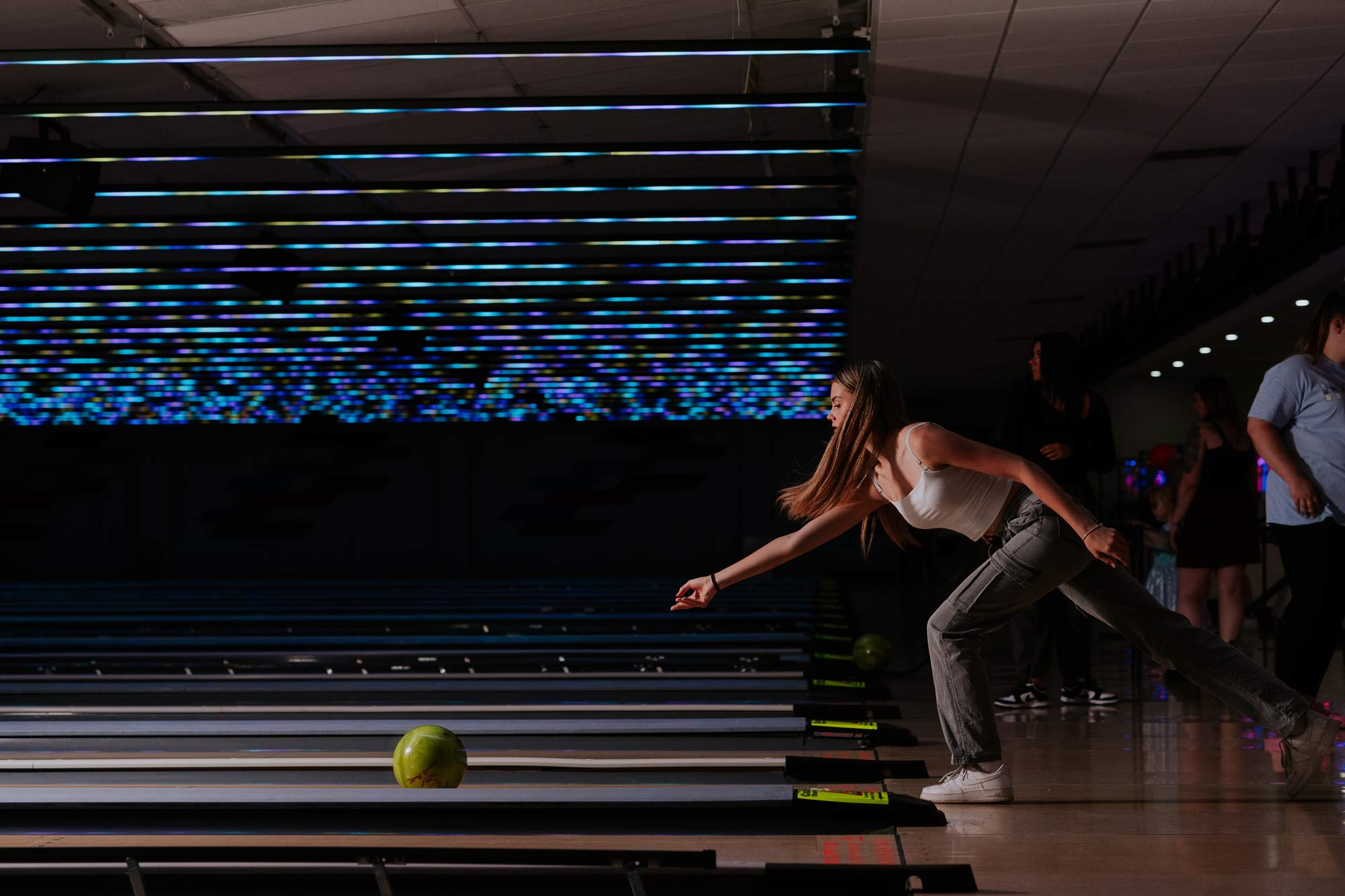 Swindon bowling side view of lanes and woman