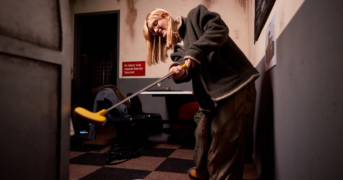 Young Woman Hitting A Crazy Golf Ball