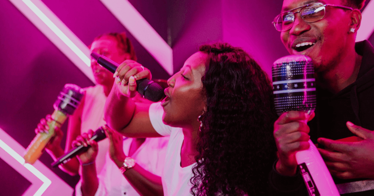 Group Of Friends Singing In A Private Karaoke Room (1)