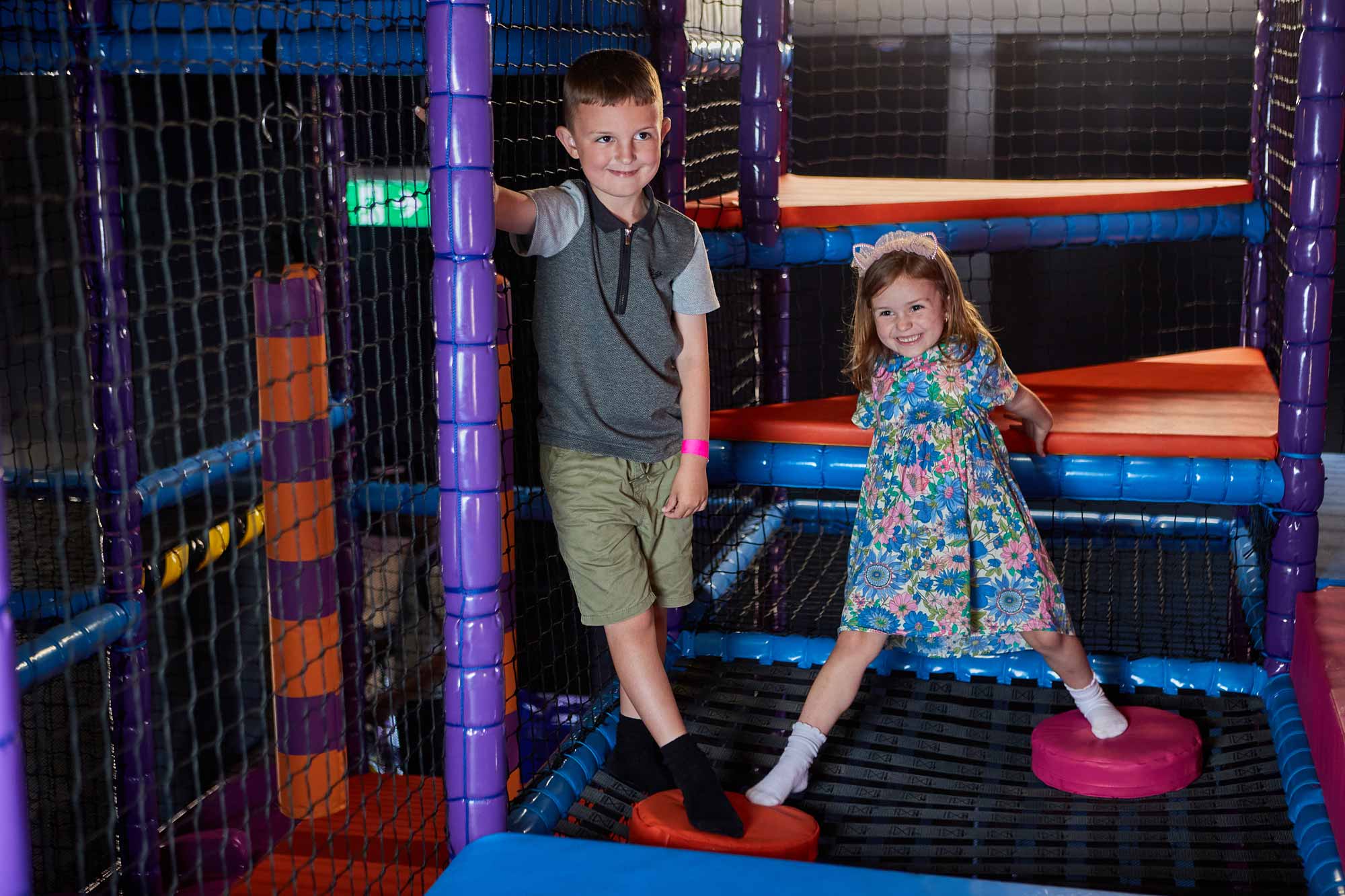 Boy And Girl Playing In Soft Play Area In Tenpin