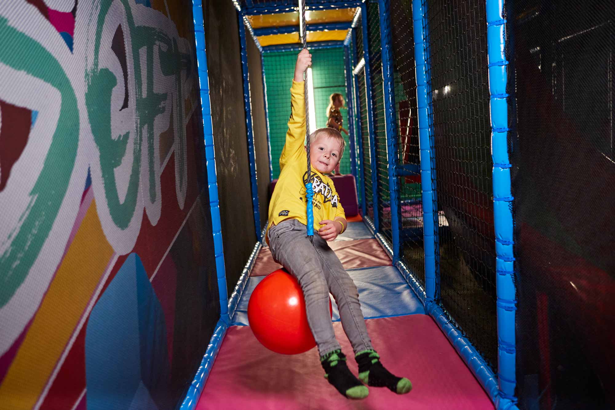 Little Boy Playing In Soft Play In Tenpin Centre