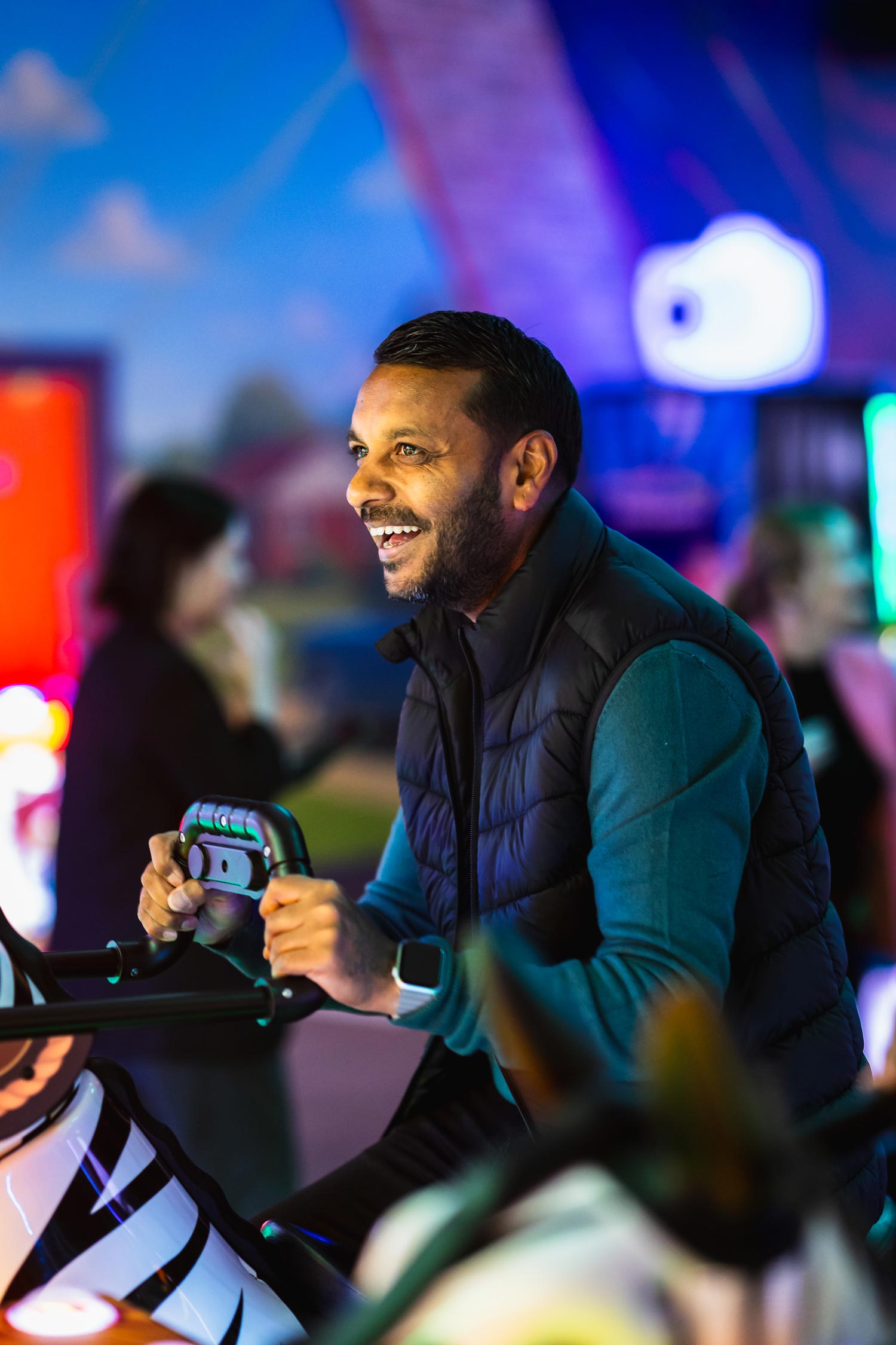 Man Playing Arcade Game In A Tenpin Centre