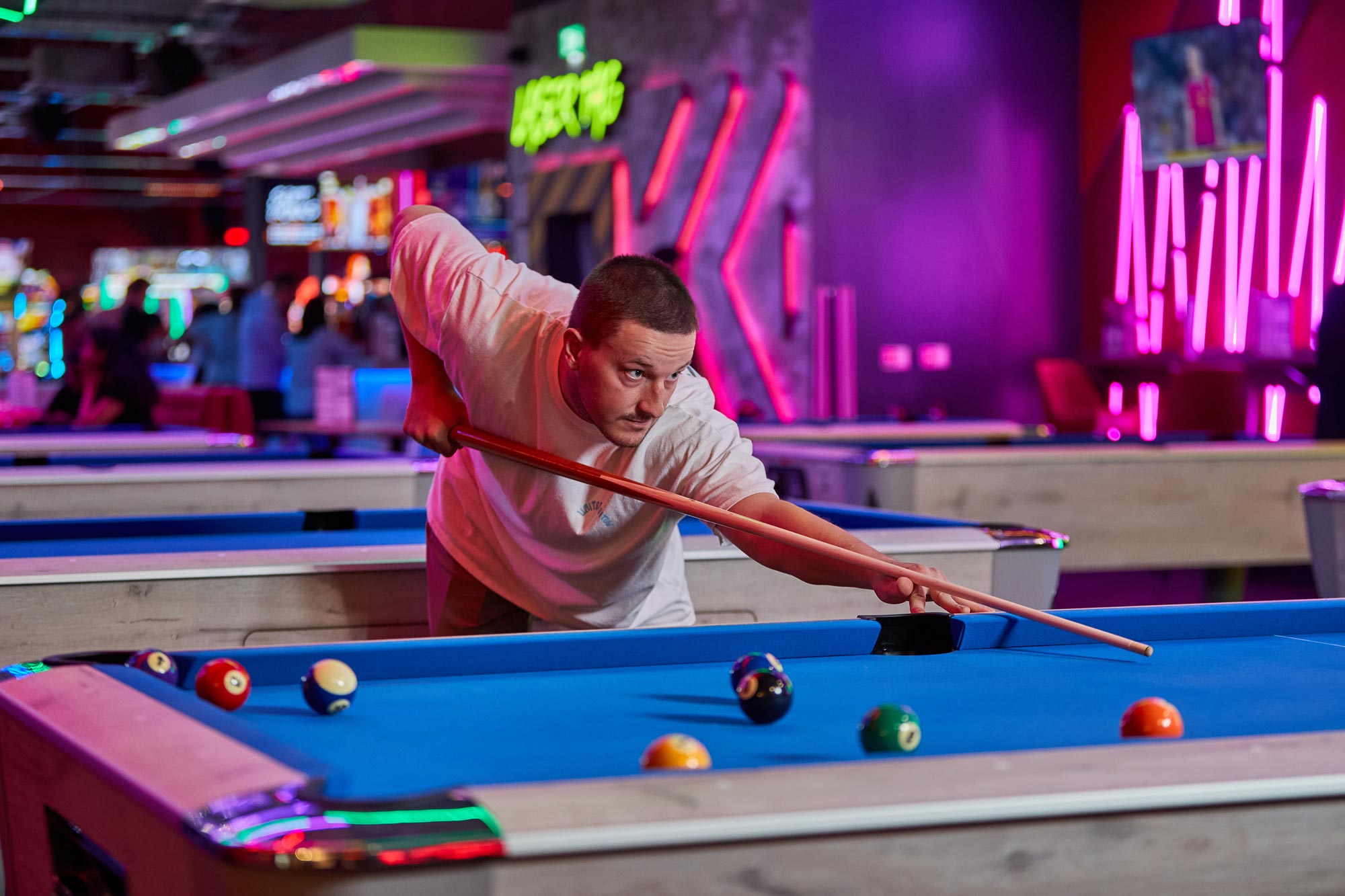Man Playing Pool In Tenpin