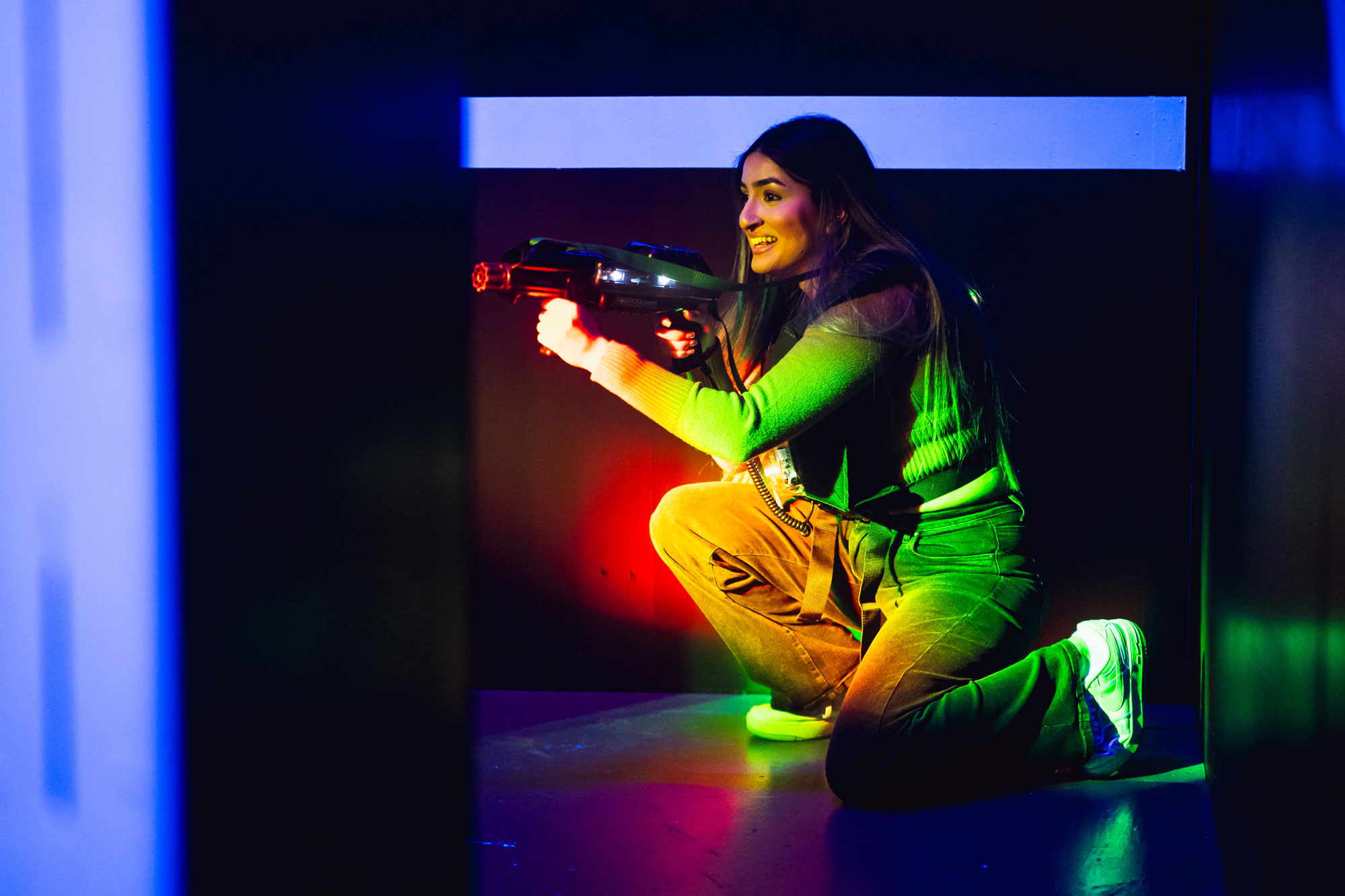 Woman Playing Laser Tag
