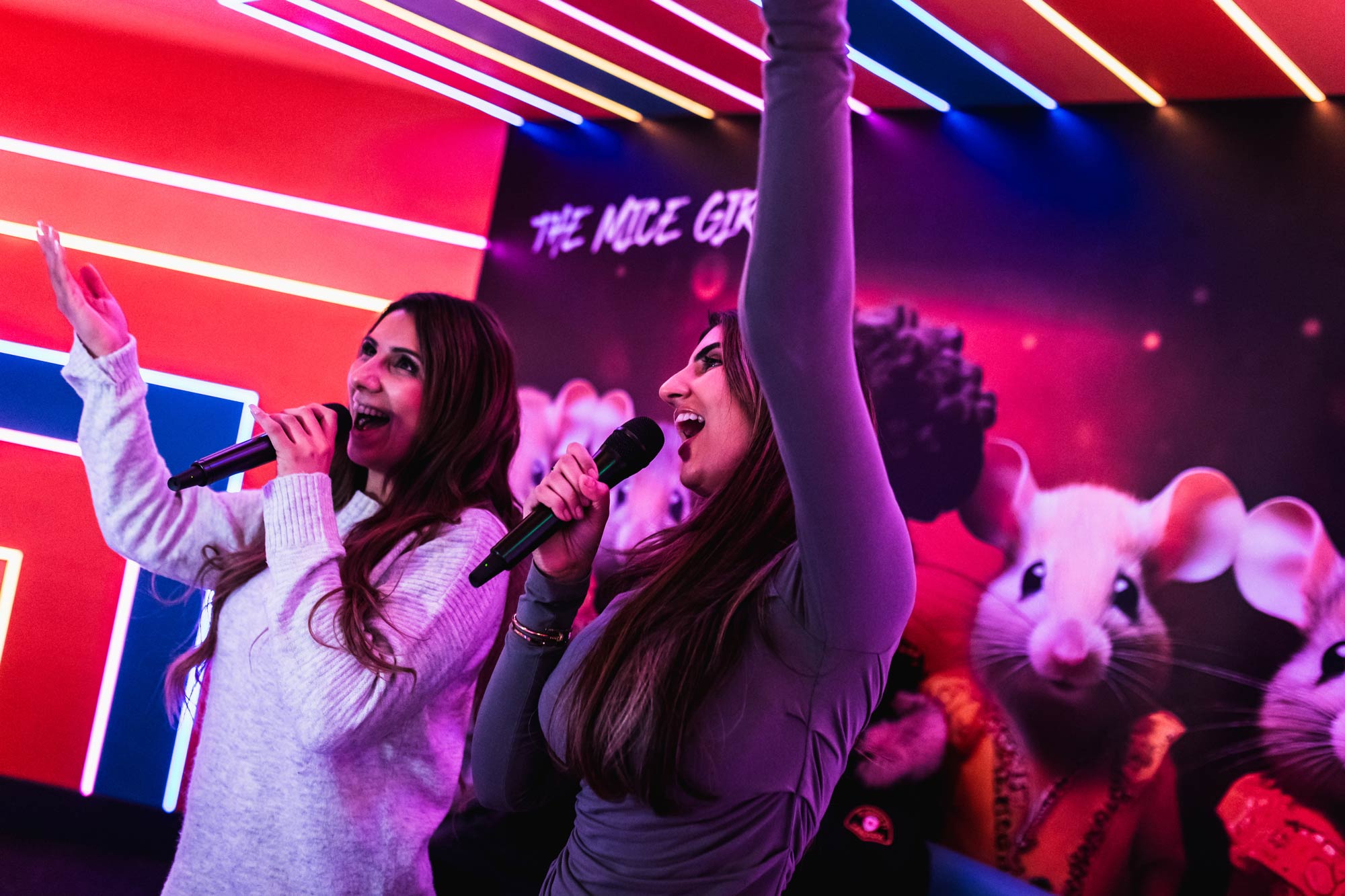 Women Singing Karaoke In Tenpin Karaoke Room